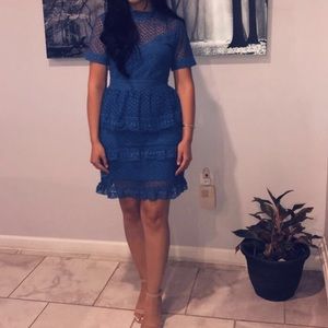A short blue dress